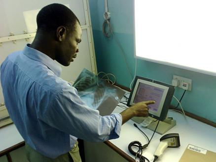Rashid Demonstrates the X-Ray Process: One of the best-loved features of the Baobab system is its use with tracking and reporting on x-rays.
